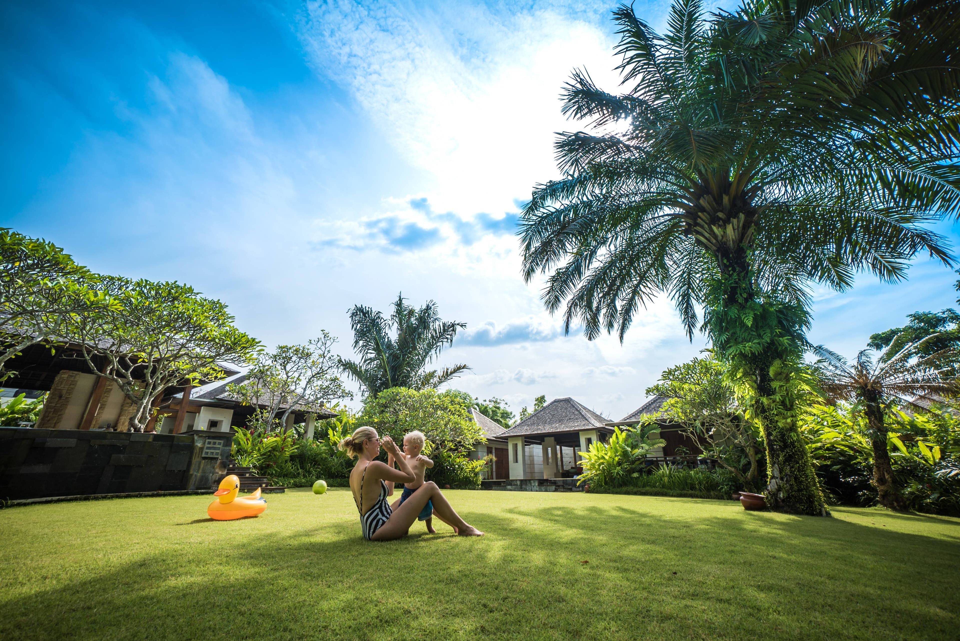 The Beji Enjoy Playing On The Extensive Villa Lawn